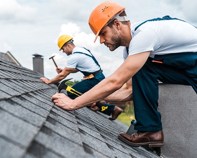 a man fixing roof